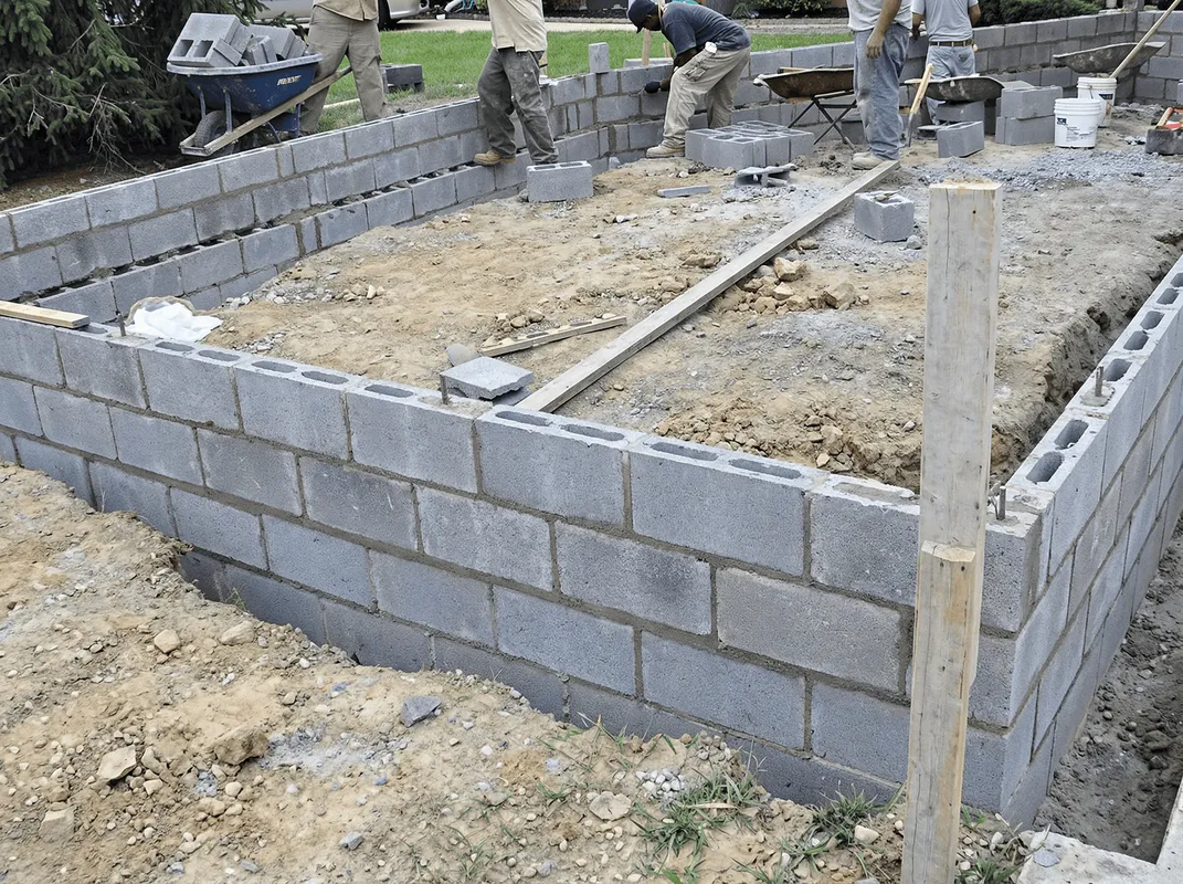 Professionals building a foundation with blocks in Lincoln, NE