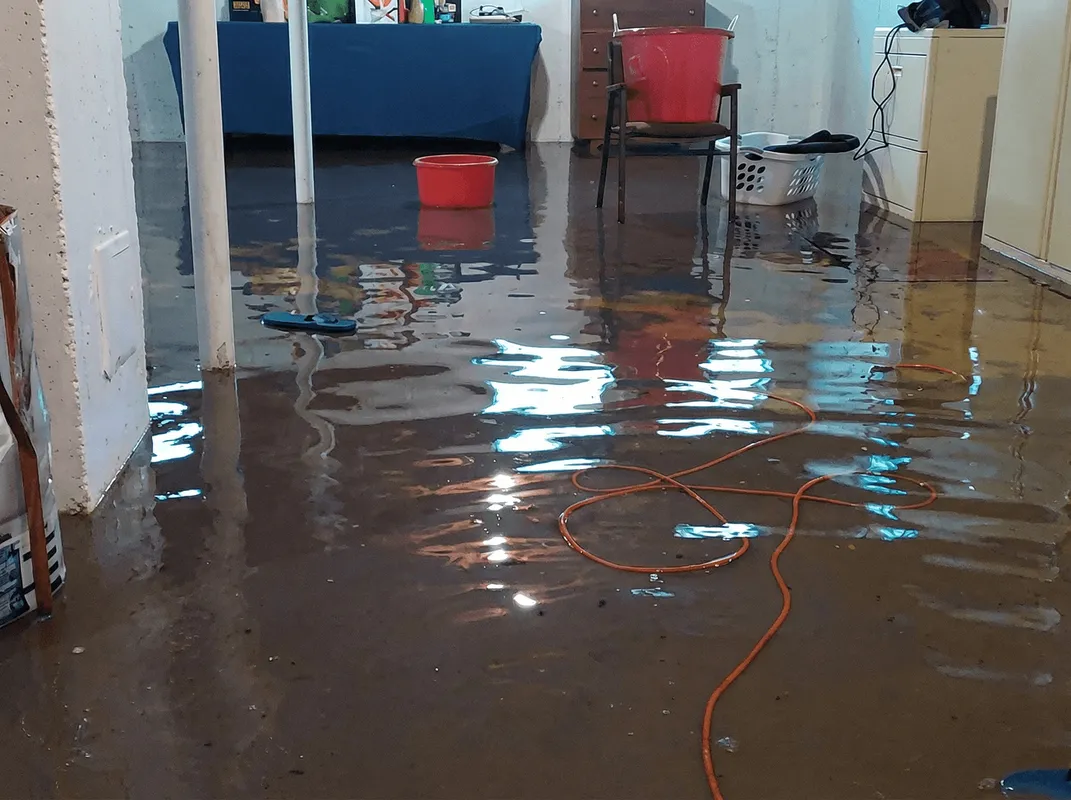 Basement with boiler, cabinets and washing machine completely flooded in Lincoln, NE